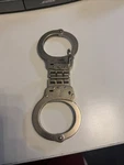 Handcuffs Smith And Wesson Model 300-1 Heavy Duty Hinged Double Locking. Fixed Price $43.00.