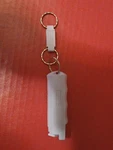 Sabre Flip Top Keychain Bursts Purple Pepper Spray. Fixed Price $10.00.