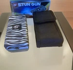 Rechargeable Stun Gun 10 Mil Volts With Led Light - Black & White. Fixed Price $17.50.
