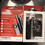 Set Of Two Armadillo Defense Pepper Spray & Panic Alarm Key Chain W/ Light. Fixed Price $18.99.