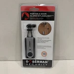 Doberman Security Portable Door Alarm W/ Flashlight Traveler Defense. Fixed Price $20.38.