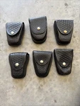 Lot Of 6 Single And Double Handcuff Holster/case , Black Basket Weave. Fixed Price $49.00.