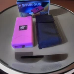 Rechargeable Stun Gun 10 Mil Volts With Led Light - Pink. Fixed Price $17.50.